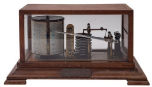 An Edwardian oak cased barograph with usual six-layer pump, ink bottle and spring-wound mechanism,