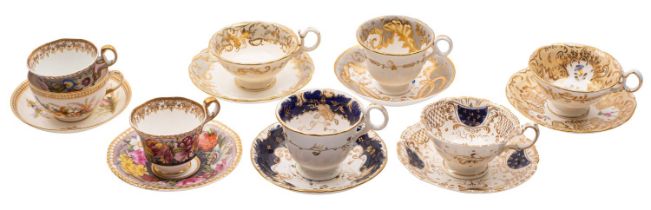 A group of seven 19th English porcelain teacups and saucers comprising a Spode cup and saucer and a