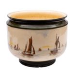 A Royal Doulton Series Ware pottery jardiniere the exterior decorated with an extensive coastal