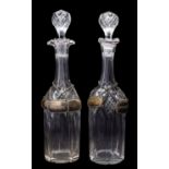 A mixed group of glass, comprising a pair of cut decanters and stoppers,