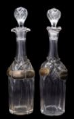A mixed group of glass, comprising a pair of cut decanters and stoppers,
