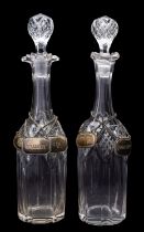 A mixed group of glass, comprising a pair of cut decanters and stoppers,