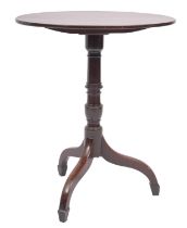 An early 19th-century mahogany oval occasional table;