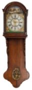 A Dutch staart wall clock the weight-driven movement striking on a bell,