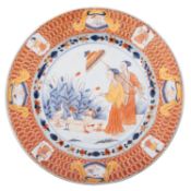 A Chinese 'La Dame au Parasol' plate decorated in rouge-de-fer after the design by Cornelis Pronk,