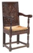 A 17th-century and later carved oak Wainscot chair;