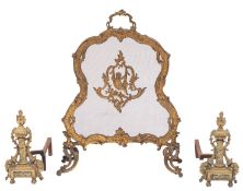 A French gilt brass cartouche shaped fire screen;