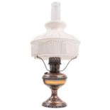 A copper and glass table oil lamp, 20th century, by the Aladdin Mantle Lamp Co.