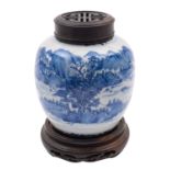 A Chinese blue and white jar painted with a continuous mountainous lake landscape within borders of