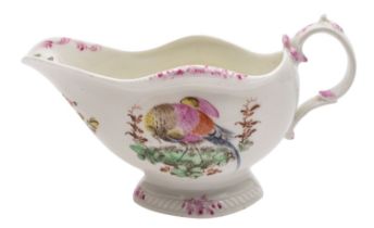 A First Period Worcester polychrome sauce boat with double scroll handle and shaped oval pedestal
