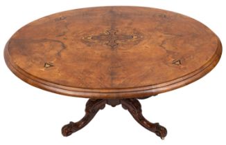 A Victorian walnut and inlaid oval breakfast or Loo table;