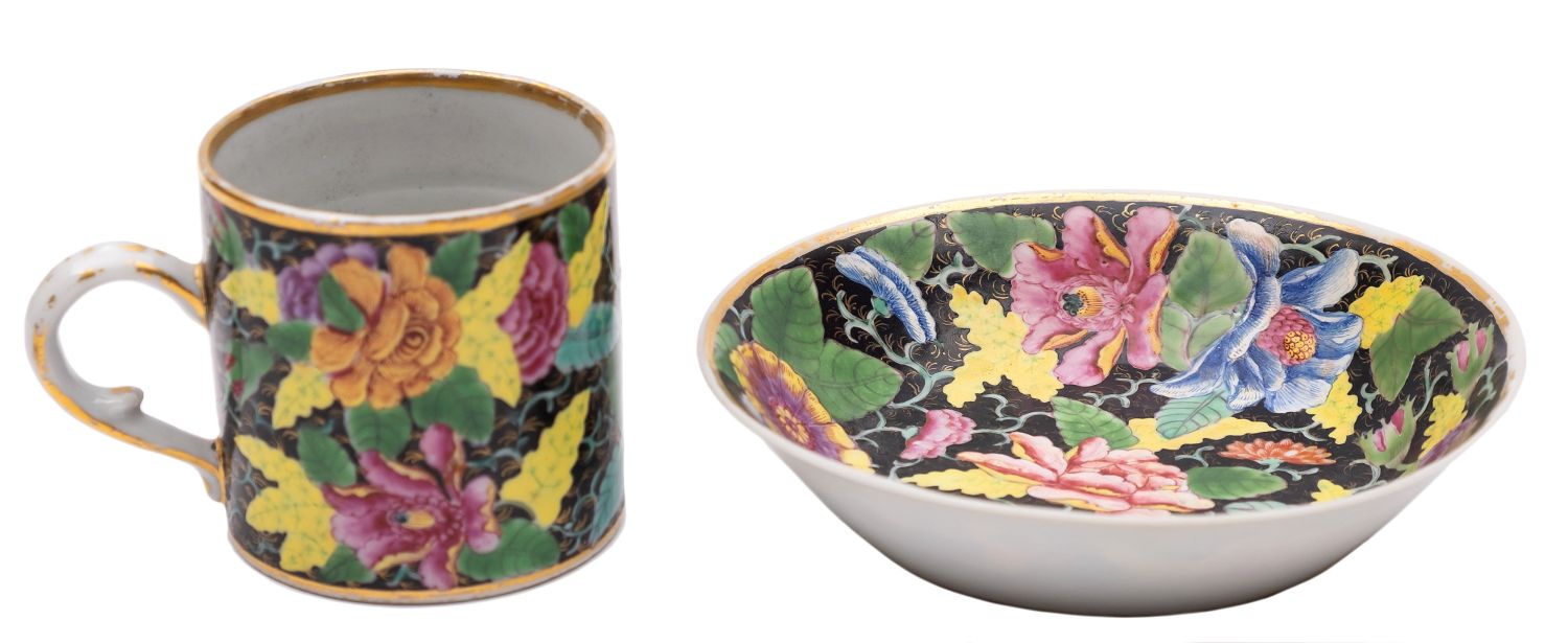 A Chinese famille rose black ground coffee can and saucer enamelled with a 'tobacco leaf' design - Image 2 of 2