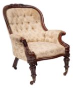 A gentleman's Victorian carved mahogany armchair;