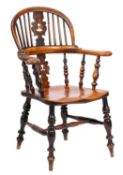 A Victorian elm and ash hoop back smoker's bow Windsor armchair;