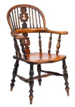 A Victorian elm and ash hoop back smoker's bow Windsor armchair;