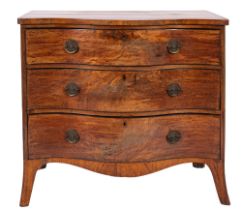 A George III mahogany serpentine front chest of drawers,