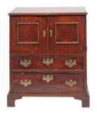 A George III mahogany adapted commode chest; enclosed by a pair of moulded panel doors,