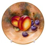 A Royal Worcester fruit painted plate and a similar small dish the first painted with peaches,