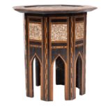A pair of Near Eastern inlaid octagonal occasional tables;