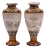 A pair of Doulton Lambeth stoneware vases by Hannah Barlow sgraffito decorated with donkeys and