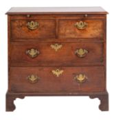 A George III mahogany rectangular chest, of small size, the top with a moulded edge,