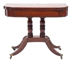 A Regency mahogany and ebony inlaid card table; of breakfront outline,