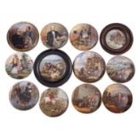 A collection of Pratt Ware pottery pot lids,