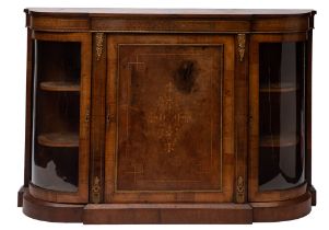 A Victorian walnut and gilt metal mounted breakfront credenza,