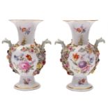 A pair of Meissen flower encrusted baluster vases with fluted rims and acanthus scroll handles,