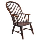 An ash, elm and oak Windsor elbow chair,
