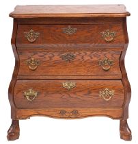 A Dutch oak three-drawer commode in 18th-century style, late 20th century; of small proportions,