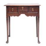 A George II oak lowboy side table,