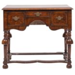 A walnut and burr veneered rectangular side table in the William and Mary style,