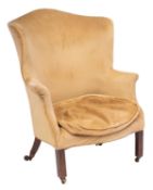 A Regency mahogany and upholstered wing armchair,