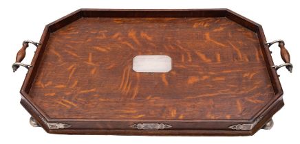 An oak and silver plated metal mounted tray,