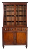 A William IV mahogany bookcase, the upper part with a moulded cornice,