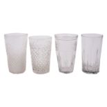 A mixed group of drinking glasses, comprising an ale mug engraved with hops and barley,