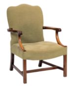 A mahogany open armchair of Gainsborough type; with an upholstered stuffover cartouche shaped back,