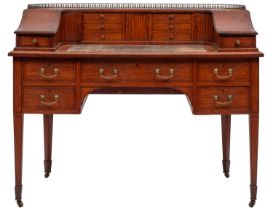 An Edwardian satinwood and inlaid Carlton House writing desk;