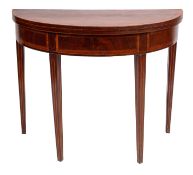 A George III mahogany crossbanded and inlaid demi lune card table, bordered with boxwood, ebony,