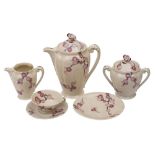 A Limoges porcelain coffee service, comprising a coffee pot and cover, sucrier and cover,
