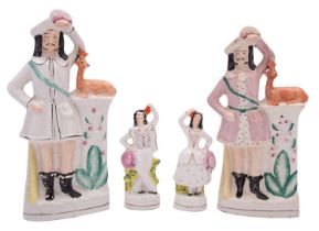 Two pairs of Staffordshire pottery figures,
