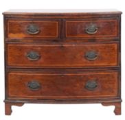 A late George III mahogany bow-front chest of drawers,
