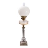 An Edwardian metal and moulded glass columnar table oil lamp,