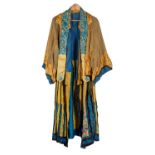 An early 20th century Chinse silk robe, in blue, yellow and black,