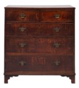 A George III oak rectangular chest; the top with a reeded edge,