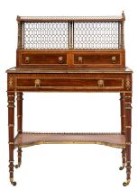 A Regency rosewood, inlaid and brass mounted Bonheur du Jour in the manner of John McLean,