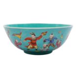 A Chinese porcelain turquoise ground 'Boys' bowl,