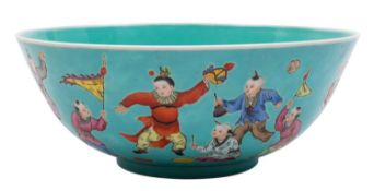 A Chinese porcelain turquoise ground 'Boys' bowl,