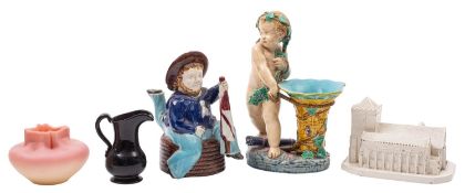 A mixed lot of pottery and glass comprising a Minton majolica cupid vase, date code for 1864,